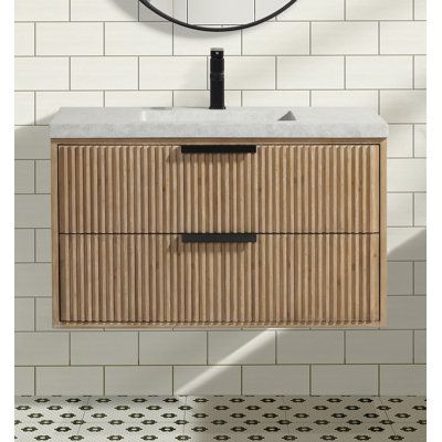 Add a mid-century modern look to your bathroom with this 36" vanity set. Handcrafted from a mix of solid walnut wood and engineered wood, this single piece features a distressed finish with wood scoring and wormholes for a reclaimed feel. The concrete countertop in white adds a sleek contrast to the base, while the integrated sink offers a cohesive design. Two functional drawers with soft-close glides provide ample storage for your toiletries, and the matte black hardware completes the look. We Vanity Cupboard Bathroom, Concrete Vanity Top, Concrete Vanity, 36" Vanity, Rest Room, Vanity Sets, Floating Bathroom Vanity, Single Sink Vanity, Concrete Stone