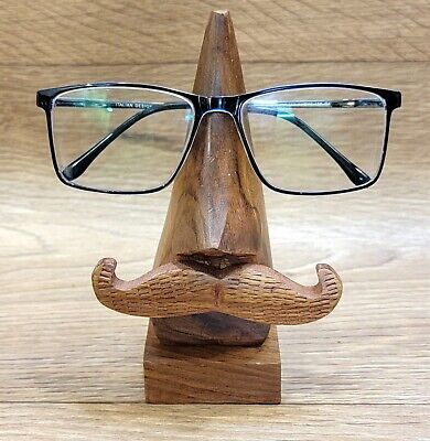 The Wooden Glasses Stand is the perfect accessory for your night stand or dresser in the bedroom, or on your desk at the office. Shesham Wood. Wooden Glasses Stand, Wooden Glasses, Glasses Stand, In The Bedroom, Eyeglass Holder, Night Stand, The Bedroom, Eyeglass Case, Spectacles