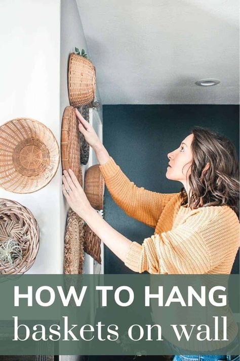 Don't you just love how wicker baskets add a unique boho look with amazing textures? Then you gotta read this article about where to buy cheap baskets and how to hang them! #boho #walldecor #wickerbaskets #wicker #rattan Boho Wall Basket Decor Living Room, Boho Stairwell, Wicker Baskets On Wall, Basket Wall Ideas, Wicker Basket Wall Art, Diy Basket Wall, Basket On Wall, Homestead Inspiration, Wicker Basket Decor