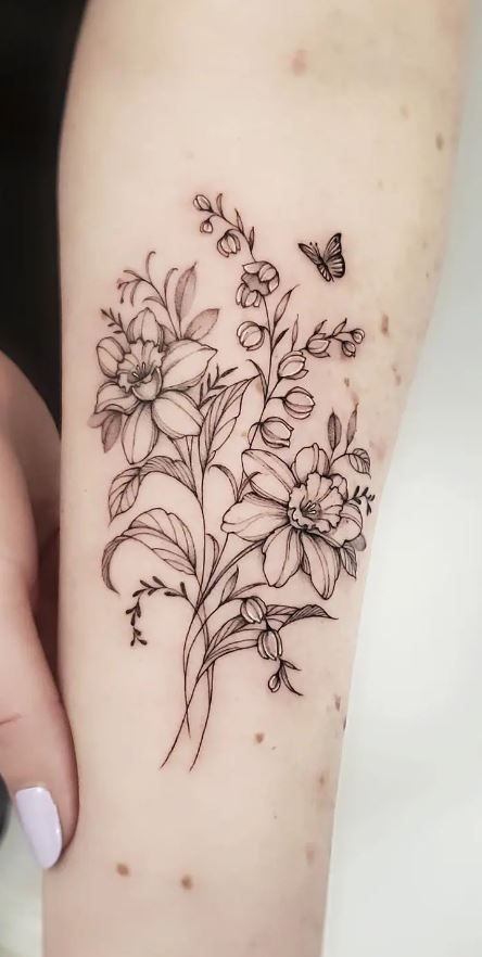 << Check out more Daffodil Tattoos, Ideas and Meanings #tattoomenow #tattooideas #tattoodesigns #tattoos #daffodil #flower #floral #birthflower Narcissus Tattoo, Daffodil Flower Tattoos, Narcissus Flower Tattoos, Daffodil Tattoo, Bouquet Tattoo, Floral Tattoo Sleeve, Birth Flower Tattoos, Forearm Tattoo Women, Flower Tattoo Sleeve