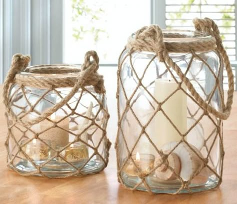 Rope Net Candle Lanterns: http://www.completely-coastal.com/2016/04/nautical-coastal-candle-lanterns-wood.html Glass Jar Lanterns with Netting for a Nod to Nautical. You can Hang these Lanterns too! Coastal Candle, Glass Candle Lantern, Diy Jar Crafts, Rope Wrapped, Candle Lantern, Mothers Day Crafts For Kids, Rope Crafts, Jar Diy, Glass Lantern