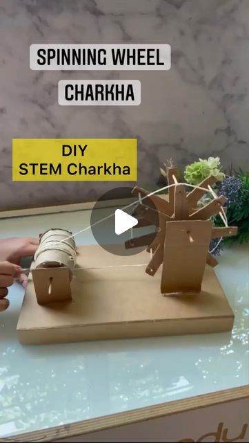 Shraddha Fogla 🇮🇳 on Instagram: "#save Charkha STEM DIY  Paying tribute to the father of our nation Mahatma Gandhi.   🇮🇳 How to make :   Step 1: Cut a circle and make spikes on one and measure it on the other and cut your Charka wheel.   Step 2 : Make holes like in the video and insert toothpicks to make a wheel   Step 3 : cut 2 long strips of cardboard for holding this wheel . It should be the same size   Step 4 : take a skewer and pass it through the middle of the round charka and the two long strips to make it stand ( like in the video) and like a ferris wheel   Step 5 : take a toilet roll and put round cardboard ok the sides to close the open ends .   Step 6: take two short strips of cardboard and using a skewer insert in the sstrip, then the toilet roll and then the strip again an Wheel Crafts, Coca Cola Can, Mahatma Gandhi, Toilet Roll, Spinning Wheel, Take Two, Viral Pins, Skewers, Spinning