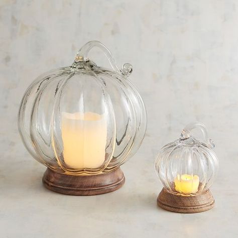 What a beautiful way to light up an autumn night. Our handblown glass pumpkin perched on a mango wood base is gorgeous even without the added candlelight. Fall Candle Decor, Pumpkin Candle Holder, Fall Decor Dollar Tree, Fall Decorating Ideas, Simple Farmhouse, Pumpkin Candle, Fall Thanksgiving Decor, Pumpkin Candles, Autumn Decorating