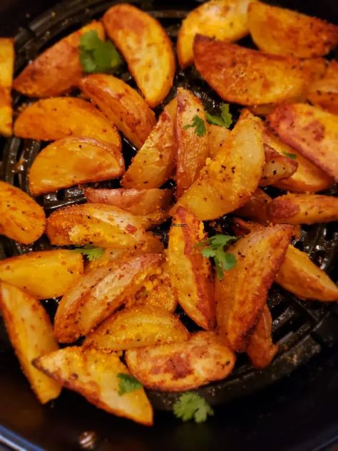 Air fried Spicy Potato Wedges - myspicetrunk Potato Wedges Fried, Roasted Whole Cauliflower, Tofu Buddha Bowl, Spicy Potato Wedges, Whole Cauliflower, Potato Diet, Crispy Potato Wedges, Sundried Tomato Pesto, Air Fryer Oven Recipes