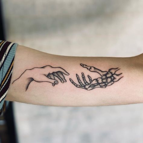 23 Skeleton Hand Tattoos for Everyone in 2021 - Page 5 of 5 - Small Tattoos & Ideas Hand Touching Skeleton Hand Tattoo, Patchwork Chest Tattoo Female, Two Hands Tattoo, Skeleton Hand Tattoos, Small Tattoos Ideas, Patchwork Tattoo, Small Forearm Tattoos, Sharpie Tattoos, Cool Arm Tattoos