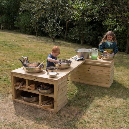 Create endless storage and play possibilities with this wooden shelving and table set. Outdoor Play Kitchen, Eyfs Outdoor, Potting Station, Mud Kitchens, Wooden Shelving, Outdoor Learning Spaces, Outdoor Play Spaces, Nature School, Storage Table