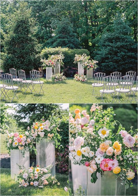 A backyard wedding ceremony altar setup of pedestals with coral, peach, buttery yellow, and blush flowers. Summer Wedding Altar, Flowers On Pedestal Wedding, Backyard Altar, No Arch Wedding Ceremony, Ceremony Flowers Altar, Altar Ground Flowers, Floor-length Ceremony Sets With Floral Embroidery, Wedding Alter Decorations, Wedding Altar Ideas