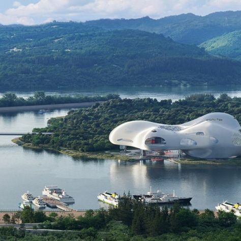 Chinese studio Open Architecture has revealed the visuals for Yichang Grand Theatre in China, which will have an amorphous form intended to evoke flowing water. Grand Theatre, Theater Architecture, Open Architecture, Architecture Models, Chinese Theatre, Outdoor Theater, Flowing Water, Body Of Water, Exhibition Space