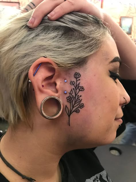 Black Outline herbal weed floral plant poppy flower side face tattoo Floral Face Tattoo, Side Face Piercing, Flower On Face Tattoo, Small Side Face Tattoos For Women, Side Of The Face Tattoo, Side Of Face Piercing, Flower Sideburn Tattoo, Floral Face Tattoos, Side Of Face Tattoo Women