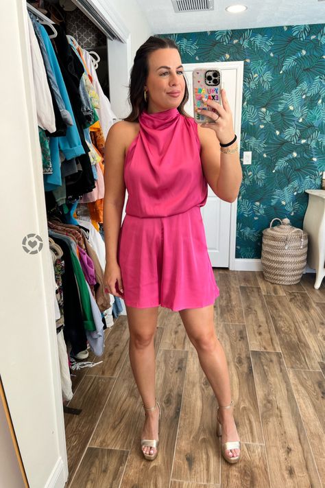 Check out this stunning pink satin romper from Amazon! An affordable fashion piece that’s perfect for receptions, parties, cocktails, date nights, girl nights, wedding guests, and special evenings. This satin romper features a a beautiful mock neck and a flowy design. It also makes a great vacation dress – simply pair it with high heel sandals for a chic touch. Shop this romper today! Holland Paterno. Early Fall Night Out Outfit: Pink Satin Romper Outfit Satin Romper Outfit, Fall Night Out Outfit, Fall Night, Satin Romper, Amazon Fashion Finds, Flowy Design, Outfit Pink, Vacation Dress, Romper Outfit