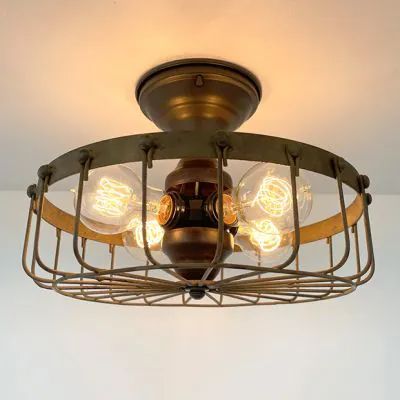 A FIRESIDE GLOW | Shop Sales Events Antique Farmhouse Cage Light Fixture, Cage Ceiling Light, Edison Bulb Lamp, Farmhouse Industrial, Cage Light, Industrial Ceiling Lights, Industrial Ceiling, Cabin Lighting, Farmhouse Chandelier