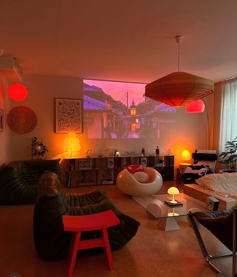 Chill Studio Apartment, Aesthetic Apartment Colorful, Retro Futuristic Living Room, 60s Living Room Decor, Colorful Lights Aesthetic, Light Maximalism, Ambient Living Room Lighting, Cozy Apartment Lighting, Ambient Room Lighting