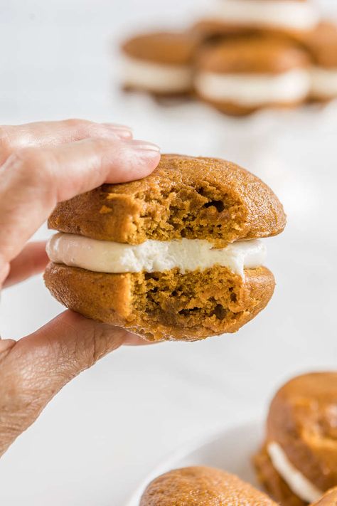 Looking for a different cookie or dessert to make? This Fall try our Pumpkin Whoopie Pie Recipe. These soft, cakey pumpkin sandwich cookies are not only adorable, but delicious. Their cream cheese filling makes them the perfect autumn treat! Get the recipe at HeyDonna.com Pumpkin Cookie Sandwich, Pumpkin Sandwich Cookies, Pumpkin Woopie Pies, Pumpkin Sandwich, Pumpkin Whoopie Pie, Pumpkin Whoopie Pie Recipe, Pumpkin Spice Treats, Whoopie Pie Recipe, Cherry Crumble