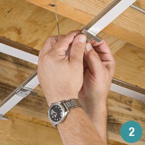 Snap on ceiling planks to an exisitng ceiling grid for a fresh wood look drop ceiling. Drop Ceiling Grid, Ceiling Planks, Ceiling Painted, Vintage Tin Ceiling Tile, Installing Wainscoting, Drop Ceiling Tiles, Armstrong Ceiling, Plank Ceiling, Ceiling Grid