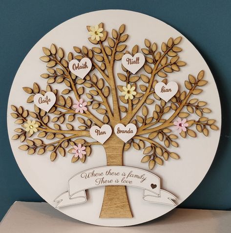 Stunning family tree! This beautiful plaque comes in 2 sizes and comes with all the members of your family each in a little heart and a quote on a banner at the base of the tree. This popular item is a perfect gift for any celebration. We also include animals in a little paw print as they're part of the family too!  This item is available in 2 sizes and the large size will fit about 30 names. We can do a custom if you have a huge family! This item now comes with the hearts seperately so you can Grandparents Valentines, Huge Family, Family Tree Gift, Laser Cut Wood Crafts, Laser Engraved Ideas, Personalised Family Tree, Wedding Guest Book Alternatives, Laser Cut Wood, Beautiful Gifts