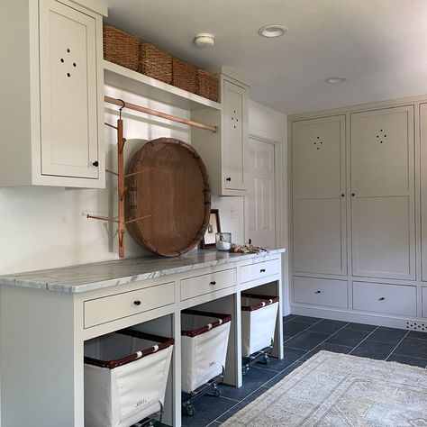 Who loves a laundry room + mudroom combo? I recently had an architect tell me he likes to separate laundry and mudrooms and I sometimes agree, but I still like it in one space for our family. I think I somehow forgot to share this little peek into our home renovation. I’m a sucker for light creamy cabinets + dark bluestone looking tile. This space was actually two separate rooms when we purchased the house. The previous owners used one room for a nursery and other for a laundry room. We dec... Brick In Laundry Room, Laundry Room With Island Ideas, Mudroom Bathroom Combo Layout, Laundry Room Mudroom Combo, Laundry Room Island, Creamy Cabinets, Laundry Mudroom Combo, Laundry Room/mudroom, Mudroom Laundry