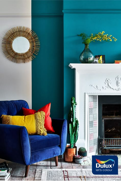 Opulent Teal Lux paired with a warm neutral will create an inviting reading corner.  #Teal #ColourTrends #Fireplace #FeatureWall Teal Walls Living Room, Victoria Living Room, Teal Living Room Ideas, Boho Glam Decor, Teal Living Room Decor, Teal Accent Walls, Teal Living Room, Teal Rooms, Living Room Turquoise