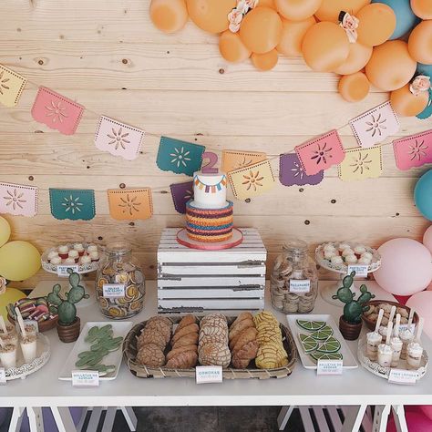 Take a look at this wonderful summer fiesta! Love the ruffle cake! See  more party ideas and share yours at CatchMyParty.com #catchmyparty  #partyideas #fiesta #mexicanparty #girlbirthdayparty #fiestadesserttable Fiesta Treats Table, Mexican Theme Party Pastel Colors, First Fiesta Dessert Table, Boho Fiesta Party, Fiesta Dessert Table, Fiesta Theme Baby Shower Ideas, Fiesta Baby Shower Ideas, Mexican Theme Baby Shower Candy Table, Classy Fiesta Theme Party