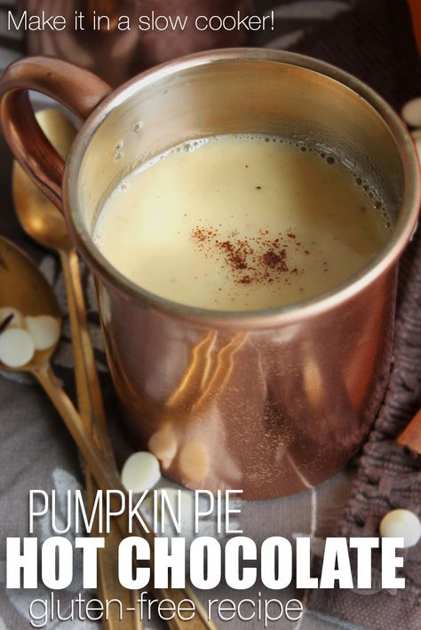 This delicious twist on a classic hot chocolate will be a new fall favorite—it's a gluten-free Pumpkin Pie Hot Chocolate! Gluten-free recipes | Gluten-free drinks | Crock pot hot chocolate | Slow cooker hot chocolate | white chocolate hot chocolate | warm beverages | Thanksgiving beverage recipes #glutenfree #thanksgiving #beverages #slowcooker #recipe Pumpkin Pie Hot Chocolate, Hot Chocolate Slow Cooker, Thanksgiving Beverages, White Chocolate Hot Chocolate, Slow Cooker Hot Chocolate, Gluten Free Hot Chocolate, Crock Pot Hot Chocolate, Gluten Free Drinks, Gluten Free Pumpkin Pie