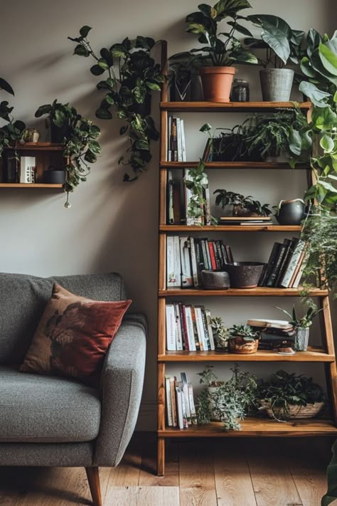 Build your own DIY ladder shelf for stylish and practical storage! A perfect addition to any room with a rustic or modern vibe. #DIYShelving #LadderShelf #HomeOrganization Wooden Pallet Bookshelf, Book Shelf Next To Tv, Book Plant Shelf, Small Living Room Bookshelf, Book And Plant Room, Styling A Ladder Shelf, Living Room Ladder Shelves, Ladder Bookshelf Living Room, Tall Shelves Living Room