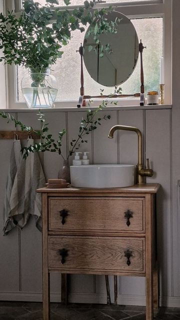 Anita- previously @we_are_the_russells on Instagram: "I've had so many questions about this little unit in the bathroom. Here is how I transformed it from an unloved set of drawers to a wash stand for new bathroom ✨️ TOTAL COST: £180 This includes the unit, the sink, tap, brass waste pipe and plastic u-bend for the sink. As well as the varnish I used to finish it off. We needed a small unit in here but big enough for a bit of storage, so this actually turned out perfect for us. What do you th Sink On Cabinet Bathroom, Small Dresser Sink Vanity, Sink In Hallway, Small Sink And Vanity, Upcycle Sink Vanity, Vintage Dresser As Bathroom Vanity, Vintage Wash Stand Sink, Oval Basin Bathroom, Small Vintage Bathroom Vanity