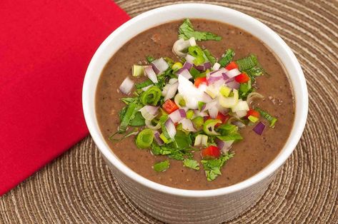 A simple, speedy version of Cuban black bean soup flavored with onion, garlic, red bell pepper, jalapeno, cumin, coriander and lime juice. #soup #recipe Cuban Black Bean Soup, Warming Soups, Easy Black Bean Soup, Black Bean Soup Recipe, Bean Soup Recipe, Cuban Cuisine, Cuban Style, Black Bean Soup, Soup Dinner