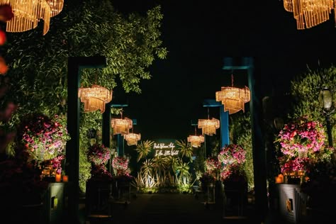 Amidst the winters and joy , crafted a subtle jungle world for Prisha’s naming ceremony ❤ . . Decor by - @wedcellevents Entertainment by - @wedcellevents Photography- @wedfield_photography . . . #wedfield #destinationweddings #destinationwedding #udaipur #decor #luxurywedding #weddingmoments #WeddingDecorTrends #WeddingDecorLove #WeddingFurniture #WeddingStyle Wedding Walkway Decor, Jungle Wedding Theme, Passage Decor, Entrance Walkway, Walkway Decor, Pathway Decor, Wedding Walkway, Green Concept, Entrance Arch