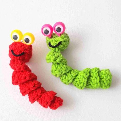 Create magical moments with this adorable "Worry Worm with Finger Puppet Eyes" crochet pattern. These little creatures will cast a spell of comfort and happiness on the hearts of kids who need it most. #CrochetMagic #WorryWormCrafts #CraftingForKids #startcrochet #crochetfingerpuppeteyes #crochetworryworms #fingerpuppeteyescrochetpattern #fingerpuppetgooglyeyescrochetpattern #crochetwithfingerpuppetgooglyeyes Worry Worm Crochet Pattern, Worm Crochet Pattern, Googly Eye Crafts, Start Crochet, Worry Worm, Spiral Crochet, Crocheted Toys, Finger Puppet, Crochet Circles