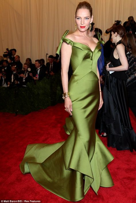 Green goddess: Uma Thurman, the 43-year-old actress in dramatic off-shoulder fishtail gown Green Evening Gowns, Met Ball, Uma Thurman, Green Gown, Kerry Washington, Kate Bosworth, Action Movie, Batman And Robin, Beautiful Prom Dresses