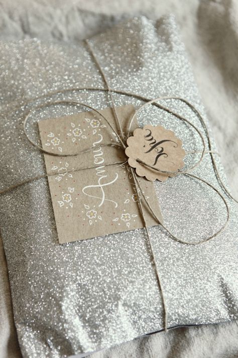 Every girl needs a little sparkle in her life, which is why this perfectly glittered wrapping paper is so fabulous. Tie it all up with some twine and the glamorous girl in your life will think it's almost too pretty to open! Purchase your own glitter wrapping paper here.  - WomansDay.com Creative Wrapping, Gift Wrapping Ideas, Gift Wrapping Inspiration, Simple Packaging, Diy Wrap, Brown Paper Packages, Creative Gift Wrapping, Diy Gift Wrapping, Cadeau Diy