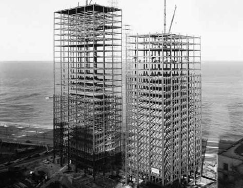 mies van der rohe buildings before completion in '55. 900/901 lake shore drive, chicago. Chicago History Museum, Crazy House, Lake Shore Drive, Ludwig Mies Van Der Rohe, Tall Buildings, Chicago History, Lake Shore, Chicago Photos, Chicago Architecture