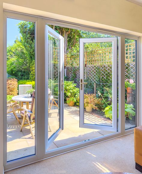 French patio doors with side windows can transform your living space with more natural light.. Patio With French Doors, Large French Doors Patio, French Doors With Side Lights, Backyard French Doors, French Sliding Doors Exterior, Doors With Side Windows, French Doors With Side Windows, Large Patio Doors, Patio Doors French