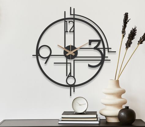 Elevate Your Space with Elegance: Unique Large Metal Wall Clock * Introduce a touch of personality and sophistication into your home or office with our exceptional Large, Modern and Minimalist Wall Clock! The clean lines and minimalist design make it a perfect addition to any modern home, and the silent quartz movement means you can enjoy the time without any annoying ticking. The oversized design makes it easy to see the time from across the room, and the unique and stylish design is sure to tu Large Metal Wall Clock, Minimalist Wall Clock, Wall Clock Unique, Decorative Wall Clock, Minimalist Wall Clocks, Unique Wall Clock, Contemporary Wall Clock, Modern Wall Clock, Wall Clock Design