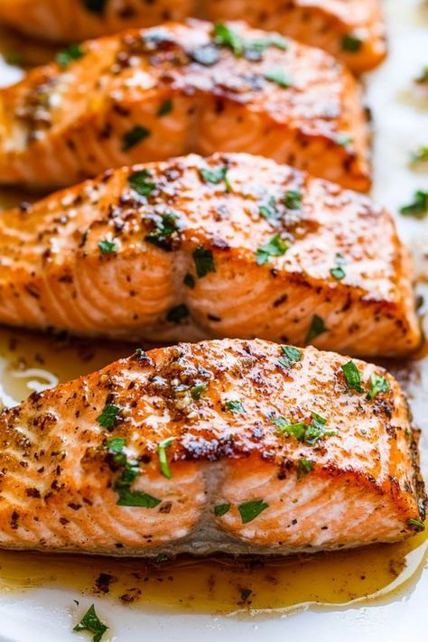 Discover a delicious twist on a classic favorite with our Honey Garlic Salmon recipe. Whether baked, cooked in an air fryer, or prepared in the oven, this dish is bursting with flavor. Try our easy-to-follow recipe for a savory and sweet meal that your whole family will love! Salmon Recipes Baked Oven, Healthy Baked Salmon Recipes, Baked Salmon Recipes Oven, Oven Cooked Salmon, Honey Baked Salmon, Salmon Recipes Baked, Oven Baked Salmon Recipes, Salmon Recipes Oven, Oven Salmon