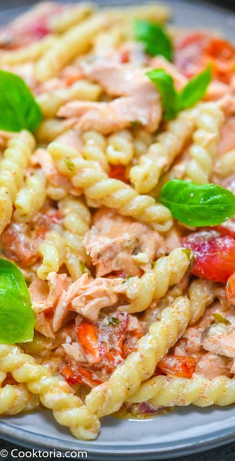 This Salmon Feta Pasta is so easy to make and is bursting with flavor. From the sweet cherry tomatoes to the baked feta, to the flaky salmon, this recipe is too delicious to miss. Healthy Korean Recipes, Salmon Noodles, Salmon Pasta Recipes, Salmon Spinach, Grilled Portobello, Smoked Salmon Recipes, Cherry Tomato Pasta, Baked Feta, Salmon Pasta