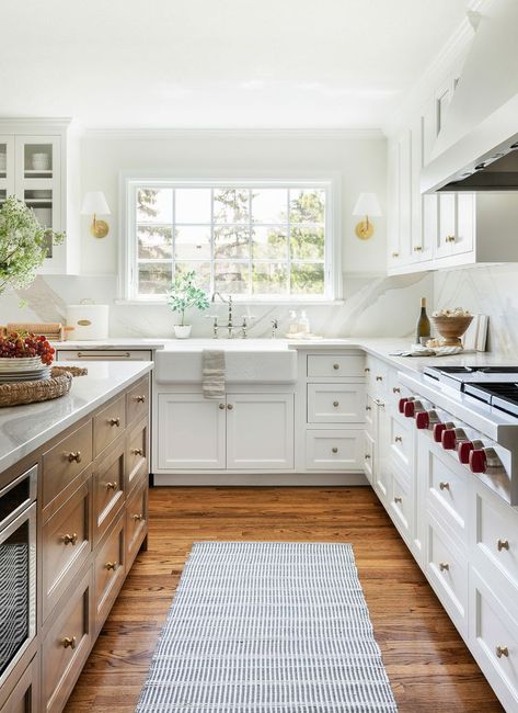 25 Transitional Kitchen Ideas You'll Never Regret Range Hood Windows On Side, Kitchen Range Hood Between Windows, Kitchen Oven Between Windows, Fridge Next To Range Kitchen Layouts, Quartz Backsplash Kitchen Range Hoods, 2023 Range Hood Trends, Range Hood Between Two Windows, Kitchen With Fridge And Range On Same Wall, Kitchen Hood Between Windows