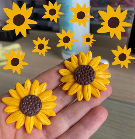 Hanade sunflowers from polymer clay. Ready to be made into earrings Clay Sunflowers, Clay Sunflowers Diy, Clay Sunflower, Polymer Clay Sunflower Tutorial, Air Dry Clay Sunflower, Sunflower Clay Art, Polymer Clay Crafts To Sell, Sunflower Clay Earrings, Polymer Clay Sunflower