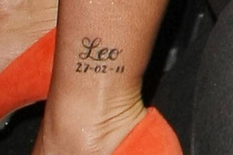 Katie Price 'Leo' tattoo Women Tattoo Placement, Purple Toe Nails, Heart Tattoos With Names, Leo Tattoo, Shoulder Blade Tattoo, Katie Price, Ribbon Tattoos, Leo Tattoos, Tattoo Prices