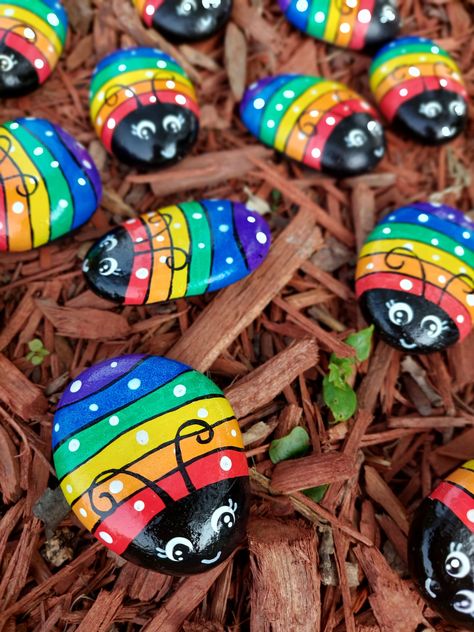 "Flower ladybugs in rainbow colors and assorted sizes.  Sizes may vary from 2 to about 3\" in length (will be selected randomly)  Ladybug rocks are painted only on one side, the bottom side is natural/not painted rock color. Rocks are sealed with few coats of high gloss varnish, so you can safely keep the rocks not only inside, but outside too- in rain, shine or cold.  This listing is good for one rainbow ladybug painted rock in randomly selected size" Ladybug Rocks Painted, Ladybug Decor, Ladybug Rocks, Pebble Garden, Garden Rock Art, Rainbow Stone, Painted Pebbles, Painted Rock Animals, Garden Art Ideas