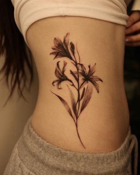 Lily Flower Tattoo Designs (All You Need To Know...And More!) - artfulinkdesigns.com Xray Flower Tattoo, Flower Tattoo Lily, Tattoo Lily Of The Valley, Tattoo Lily, Between Breast Tattoo, Xray Flower, Abstract Flower Tattoos, Flower Tattoos For Women, Tiger Lily Tattoos