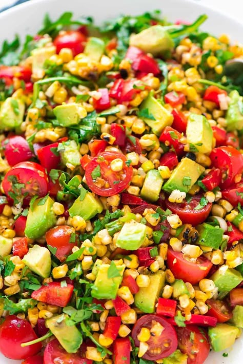 Grilled Corn Salad {With Avocado, Tomato, and Arugula} - WellPlated.com Corn Salad With Avocado, Sauteed Beet Greens, Avocado And Tomato, Avocado Salad Dressing, Grilled Corn Salad, Salad With Avocado, Bbq Side Dishes, Corn Salad Recipes, Summer Corn Salad