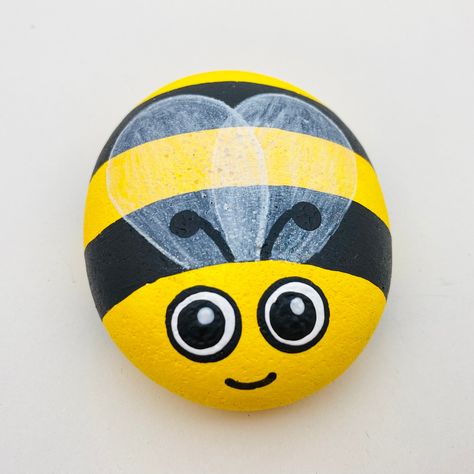 Meet Buzbee, your very own personalised, adorable hand-painted Bee Pebble – the perfect companion as a pet rock or a delightful pocket pet! Crafted with care, these pebbles are hand-cast from strong plaster using a mould created by me, ensuring each bug embodies the charm of hand-selected, natural smooth pebbles. Customise your bug by adding a name of up to 10 characters on the bottom (please provide personalisation details during checkout). Buzbee and his friends prioritise eco-friendliness, so