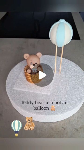 Love4sweetsandcake on Instagram: "Let's make a Teddy bear in a hot air balloon 🧸  This video takes 55 seconds and shows step by step how to make a basket a balloon and a Teddy bear.   Tip: i used a foam ball covered with fondant to create the balloon 🎈  I hope you enjoy the video and try out this tutorial 🩵  #fondantdecoration #fondantdecoration #fondanttutorial #fondanttricks #caketopper #fondant #beartopper #bearcake #hotairballoon #fondanthotairballoon #teddybeardecoration #teddybeartopper #teddybearparty" Teddy In Hot Air Balloon, Fondant Balloons On Cake, Teddy Hot Air Balloon, Teddy Bear Making Tutorials, Fondant Hot Air Balloon Tutorial, Polymer Clay Hot Air Balloon, Fondant Balloons Tutorial, How To Make Fondant Figures, How To Make Hot Air Balloon