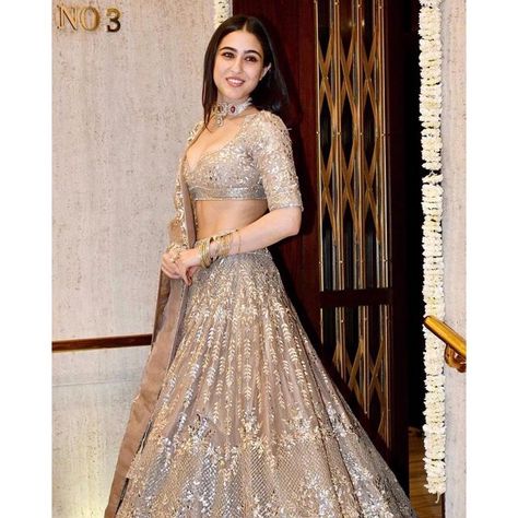 Sara Ali Khan on Instagram: "Diwali nights 🎊🎊🎊 It’s the festival of lights 🪔🪔🪔 Forget all the pettiness and fights 💝💝 Just enjoy mithai and sweet bites 🍡🍡🍡 @manishmalhotra05 @yogenshah_s" Bride Reception Dresses, Heavy Lehenga, Gold Organza, Simple Lehenga, Trendy Outfits Indian, Reception Outfit, Sweet Bites, Heavy Dresses, Wedding Lehenga Designs