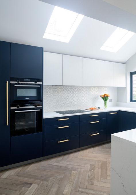 Blue Kitchen With White Cabinets, White Flat Panel Kitchen Cabinets, Flat Panel Kitchen Cabinets, Contemporary Kitchen Furniture, Clean Kitchen Design, Sleek Kitchen Design, Kitchen With White Cabinets, Black Stainless Steel Appliances, Lower Cabinets