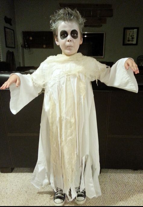 I made this simple smock style pullover out of an old white sheet using a quickly sketched, super simple pattern. Strips of frayed scraps & gauze were sewn on the outside to give it a unique, authentic look. Make-up is simply a white face, with black circled eyes and white sprayed hair. Cool Ghost Costume, Ghost Makeup Kids, Ghost Costume Sheet, Easy Ghost Costume, Ghost Face Paint, Ghost Costume Kids, Sister Halloween Costumes, Mummy Halloween Costume, Ghost Makeup