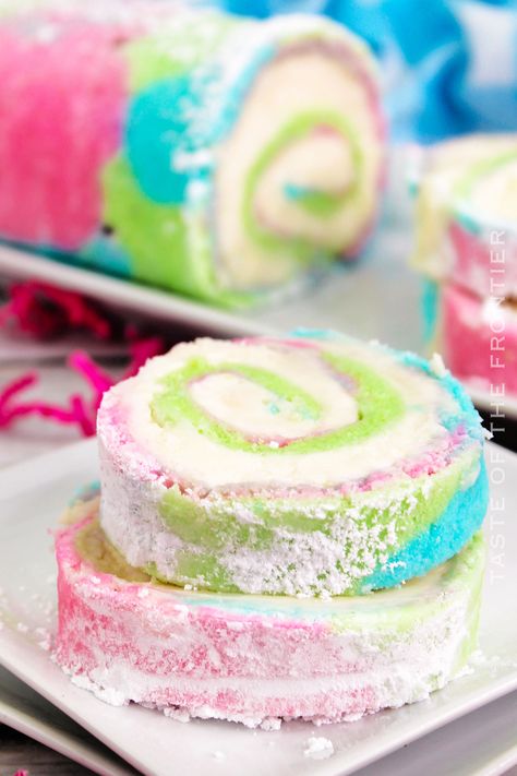 Delicious Spring Roll Cake is made with a swirl of pastel colors and filled with cream cheese frosting. It's perfect for the spring holidays. Easter Cake Roll, Lemon Cobbler, Easter Fudge, Rolo Brownies, Red Velvet Cake Roll, Dunkaroo Dip, Breakfast Bundt, Dorito Taco, Jelly Roll Cake