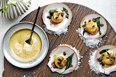 These scallops are bound to impress at your next dinner party. Christmas Entree, Dinner Party Entrees, Christmas Menu Ideas, Capers Recipe, Sage Butter, Best Seafood Recipes, Xmas Dinner, Dinner Party Recipes, Christmas Menu