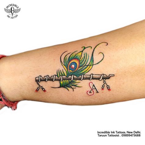 #feather #feathertattoo #flute #flutetattoo #featherflutetattoo contact us for Tattoos 09899473688 Murli Krishna Tattoo, Flute And Feather Tattoo, Flute With Feather Tattoo Designs, Flute And Peacock Feather Tattoo, Feather With Flute Tattoo, Krishna Flute Tattoo, Morpankh Tattoo, Mor Pankh Tattoo, Peacock Feather Tattoo Design