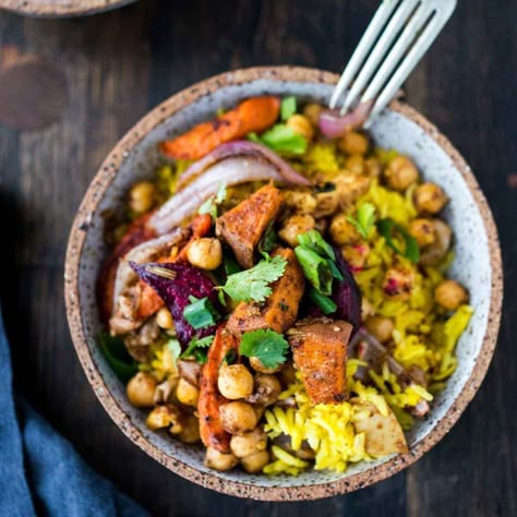 This fragrant turmeric rice bowl topped with leftover spiced roasted root vegetables and chickpeas is inspired by flavors from India for an easy, vegetarian dinner. Turmeric Rice, Chickpeas Recipe, Easy Sheet Pan Dinners, Roasted Root Vegetables, Dinner Plan, Diet Vegetarian, Root Vegetables, Rice Bowl, Vegetarian Dinner